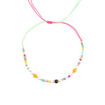 Бохо гривна за глезен с цветни мъниста и текстилен конец, идеална за лятно настроение.