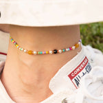 Бохо гривна за глезен с цветни мъниста и текстилен конец, идеален летен аксесоар.