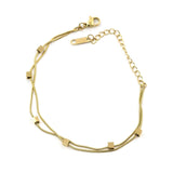 Мека гривна с кубчета за ръка златна