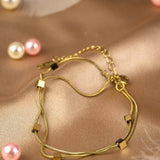 Мека гривна с кубчета за ръка златна